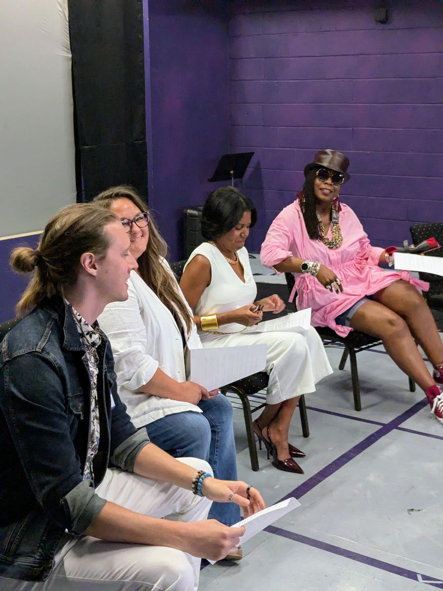 Richmond entrepreneurs sharing a laugh during a community meeting